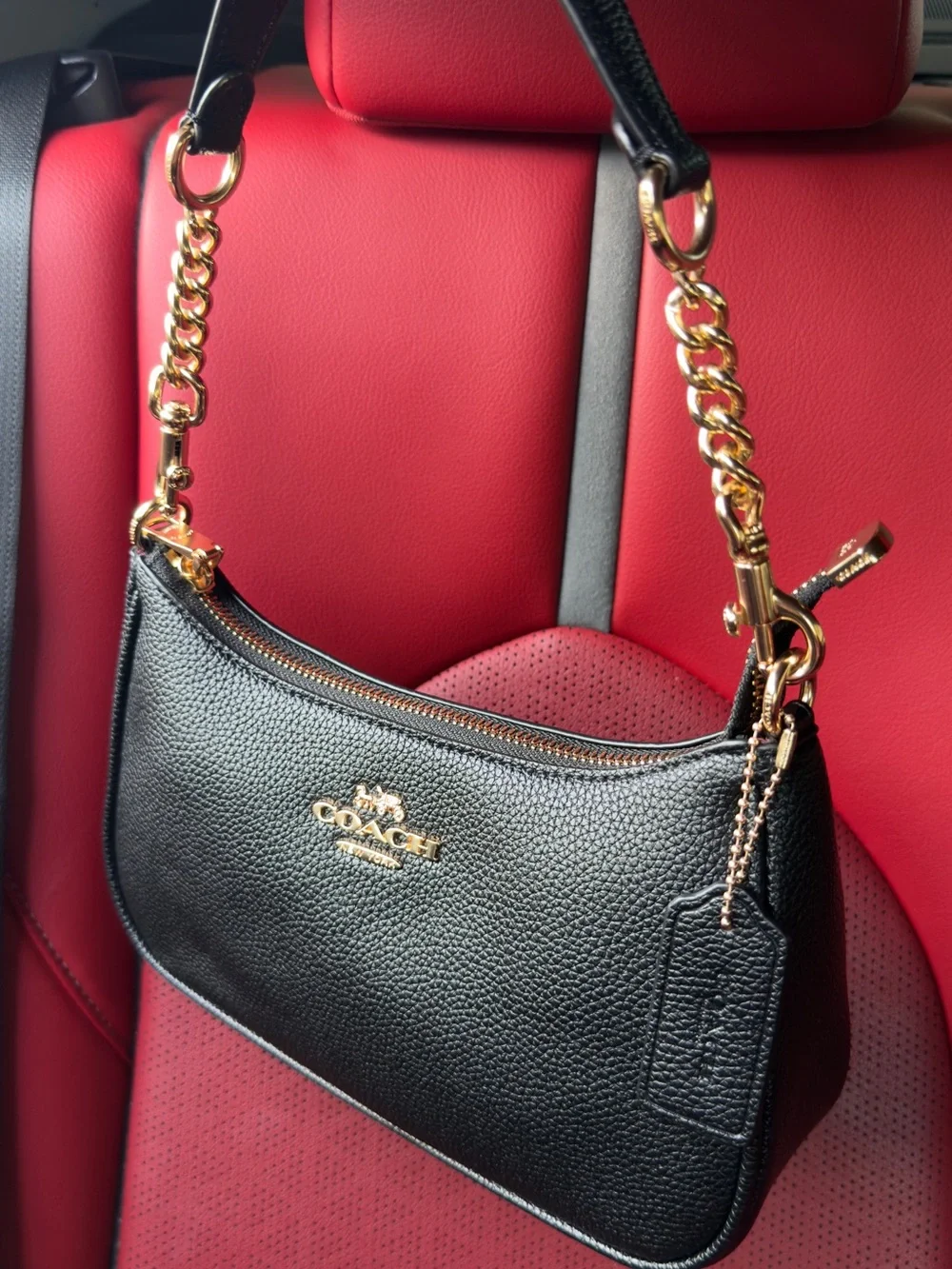 Coach Black Pebbled Leather Shoulder Bag with Gold Chain Accents